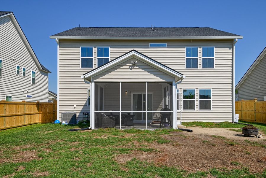 Exterior details and patio area of a home in Heron's Walk at Summers Corner, Summerville (Image 29).