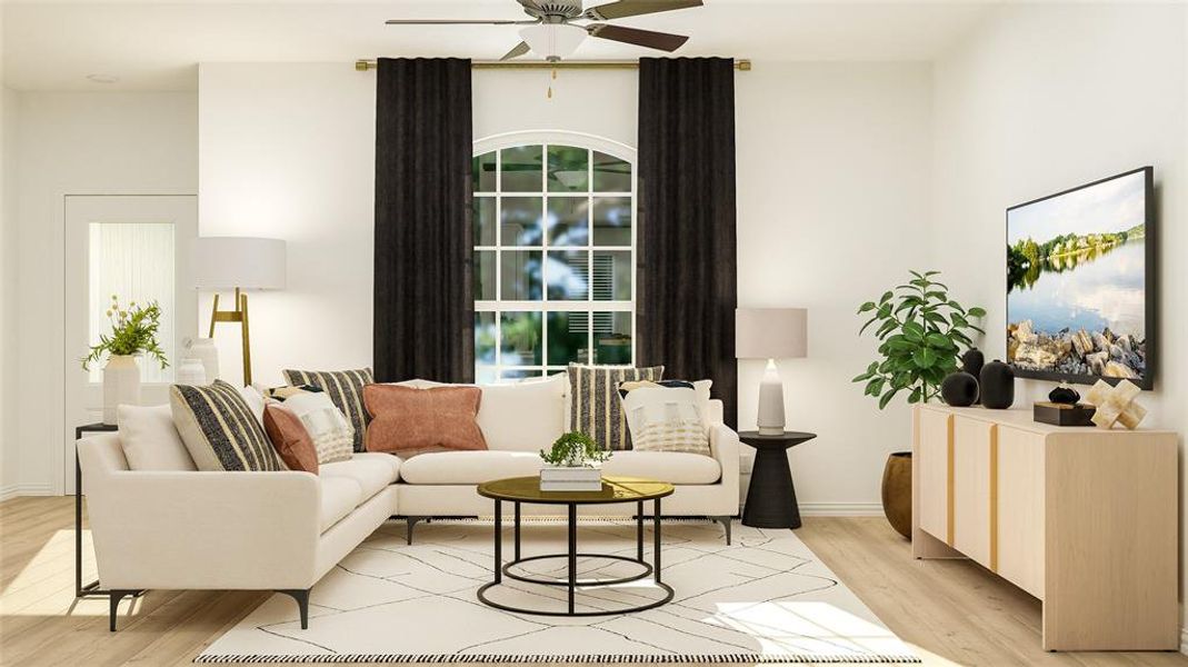 Living room with light hardwood / wood-style floors and ceiling fan