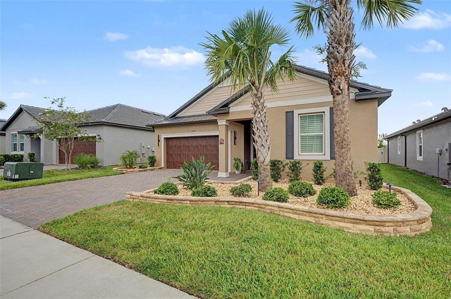 Front exterior of a new home in Mirada Active Adult, San Antonio, FL, highlighting curb appeal (Image 26). Front exterior of a new home in Mirada Active Adult, San Antonio, FL, highlighting curb appeal (Image 26).