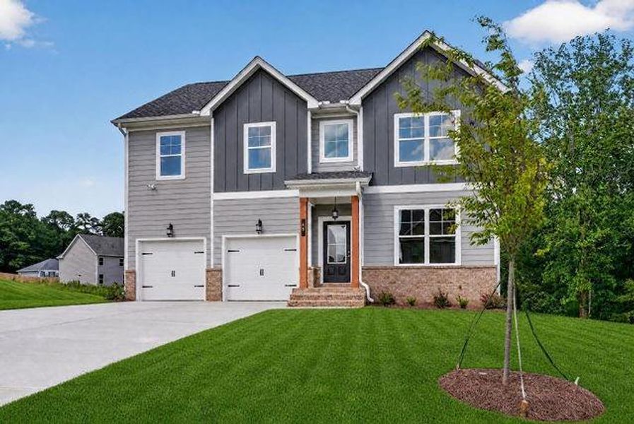 Front exterior of a new home in Austin Ridge, Commerce, GA, highlighting curb appeal (Image 20).