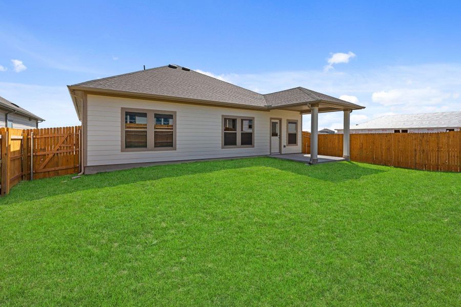 Rear of Home and Private Backyard