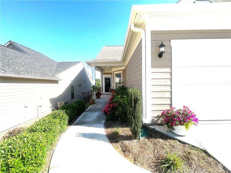 Exterior details and patio area of a home in , Hoschton (Image 24).