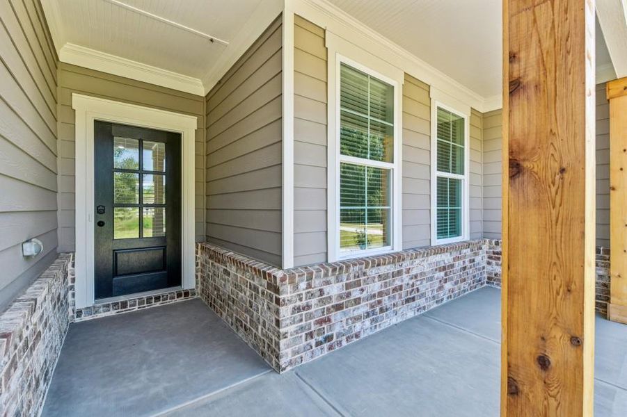 Exterior details and patio area of a home in Magnolia Ridge, Monroe (Image 25).