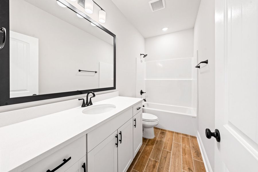 Furnished interior view inside a new home in Natureview, Freeport (Image 9).