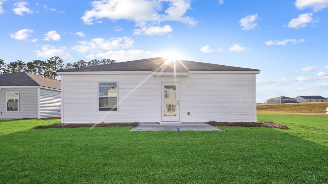 Exterior details and patio area of a home in Palm Ridge, Guyton (Image 2). Exterior details and patio area of a home in Palm Ridge, Guyton (Image 2).