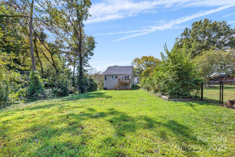 Front exterior of a new home in , Mocksville, NC, highlighting curb appeal (Image 20).