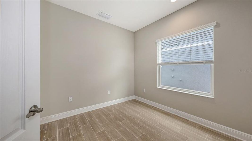 Spacious, unfurnished interior of a new home in Wildleaf, Parrish (Image 20).