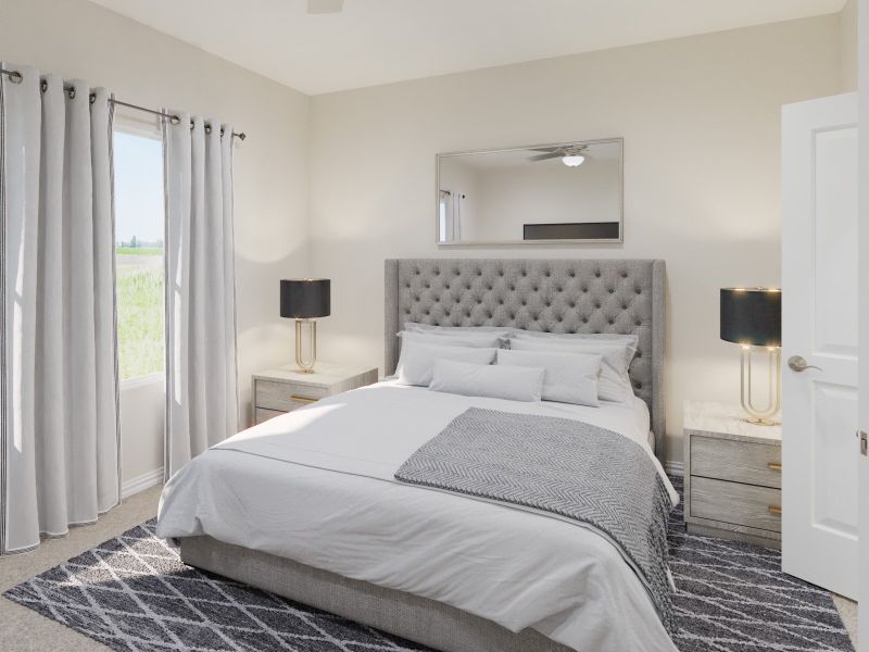 Enjoy the evening in your primary bedroom.