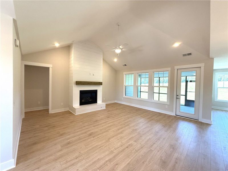 This airy living space features abundant natural l