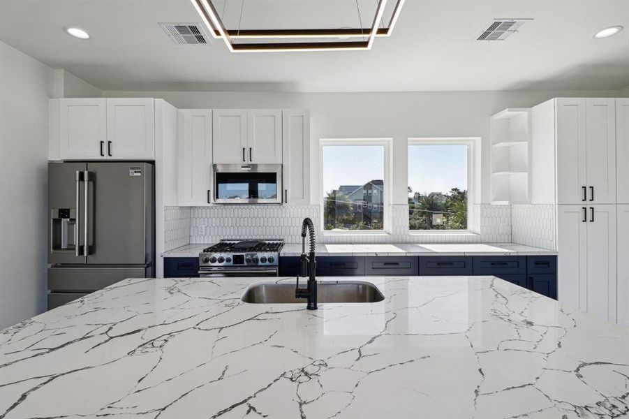 Custom cabinets and beautiful quartz countertops