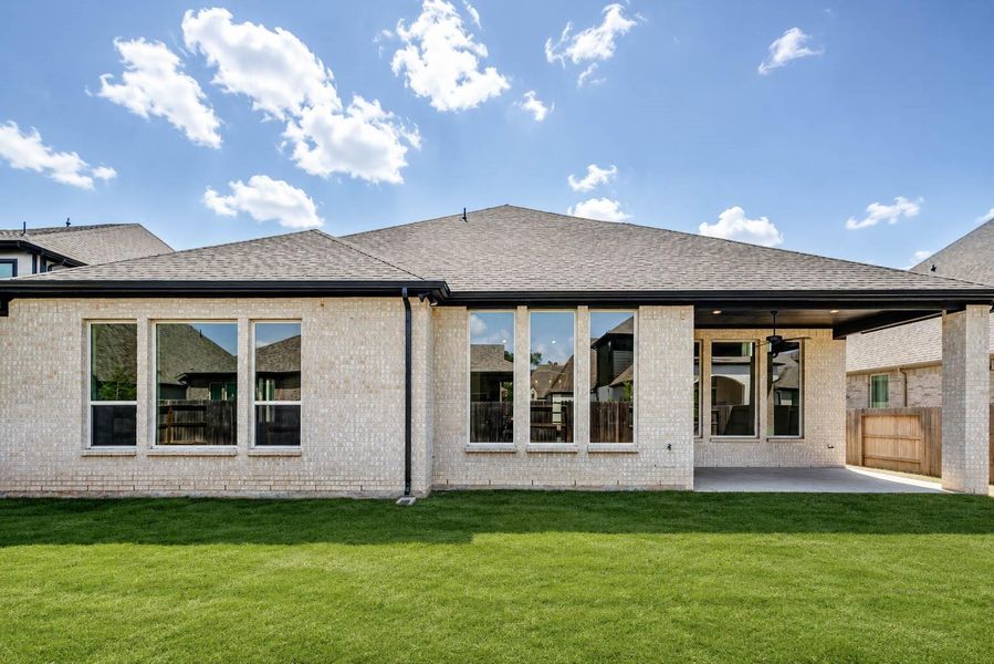 Exterior details and patio area of a home in Fulbrook on Fulshear Creek, Fulshear (Image 3).