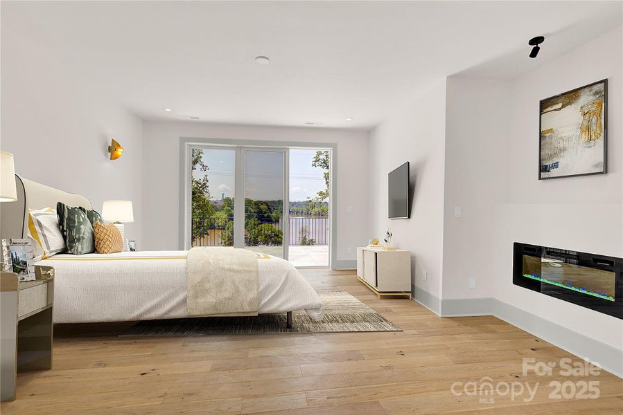 Virtually staged primary suite has access to private balcony overlooking LKN Virtually staged primary suite has access to private balcony overlooking LKN