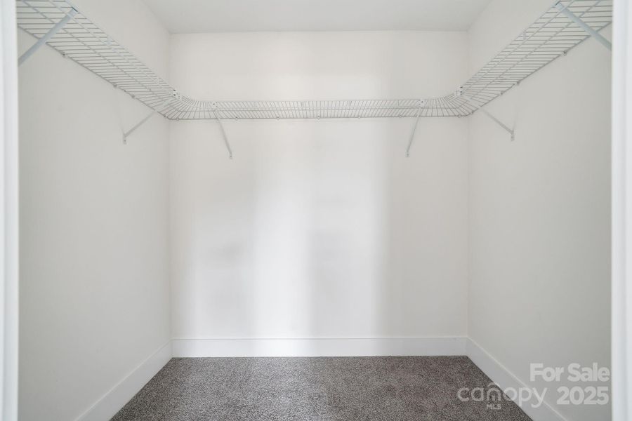 Primary Bedroom's walk-in closet