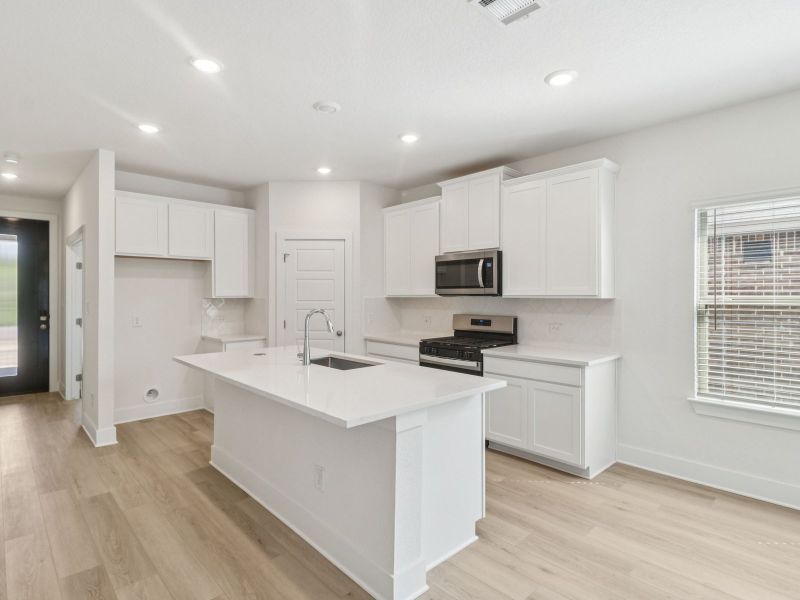 Kitchen in the Matador floorplan at a Meritage Homes community. Kitchen in the Matador floorplan at a Meritage Homes community.