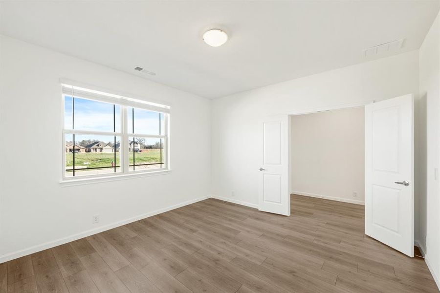 Spacious, unfurnished interior of a new home in East Oak Creek Elements, Commerce (Image 18).