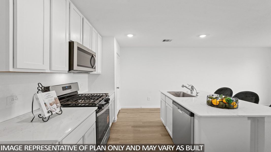 Furnished interior view inside a new home in Sunterra, Katy (Image 7).