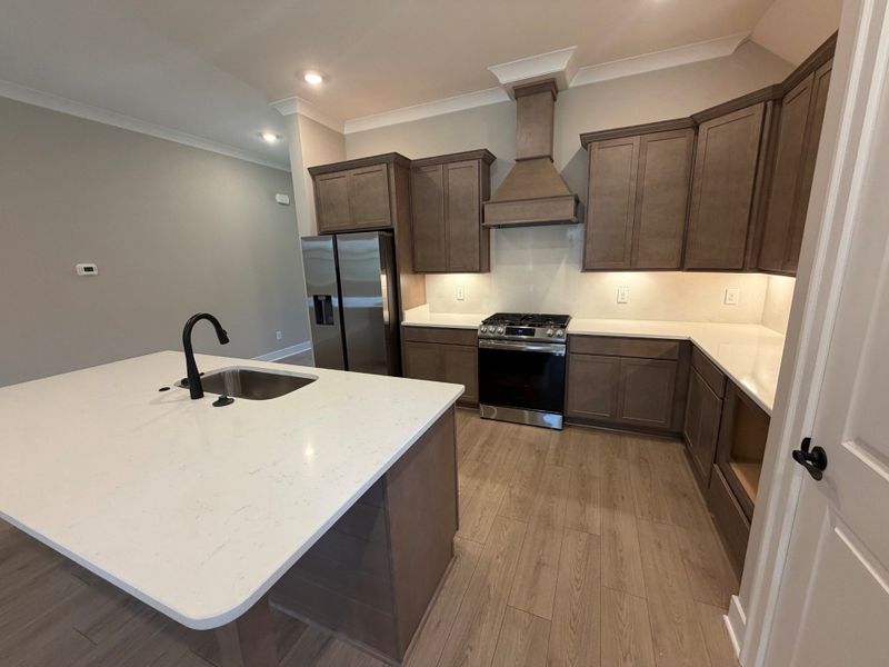 Furnished interior view inside a new home in Bluebird Hollow at Autumn Ridge, Spring Hill (Image 10).