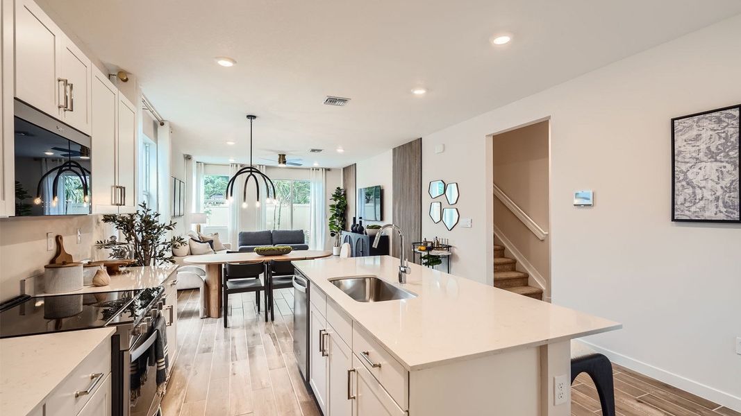 Representative furnished interior of a home built from the Grandcourt by D.R. Horton in Parker Pointe, Homestead (Image 11).