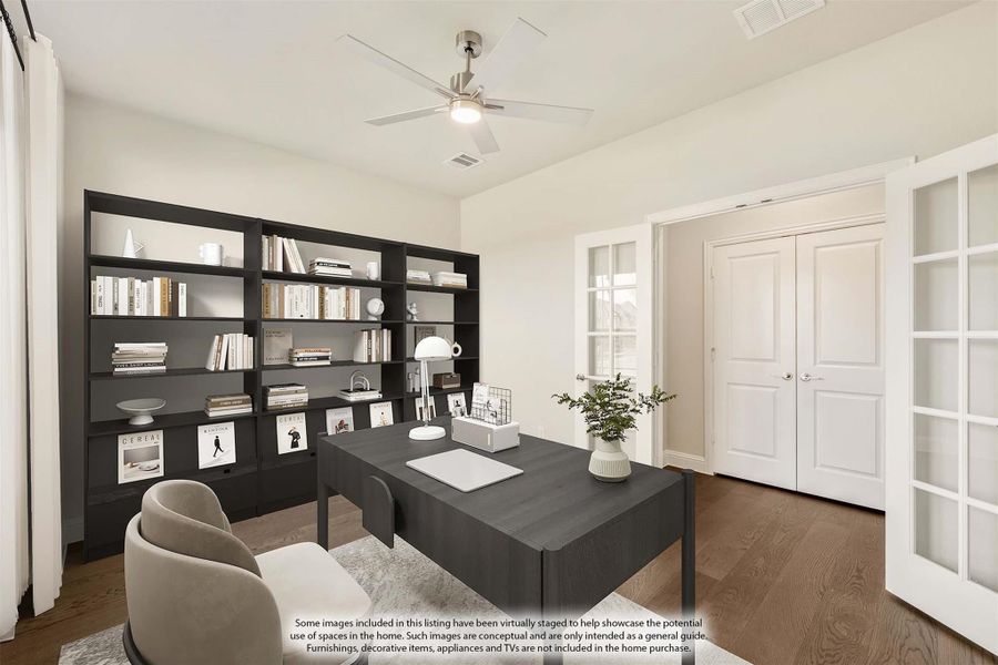 Home office with dark desk, built-in bookshelves, hardwood floors, and ceiling fan Home office with dark desk, built-in bookshelves, hardwood floors, and ceiling fan