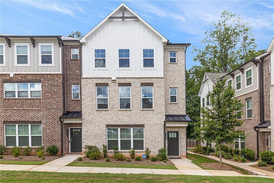 Front exterior of a new home in , Decatur, GA, highlighting curb appeal (Image 22).
