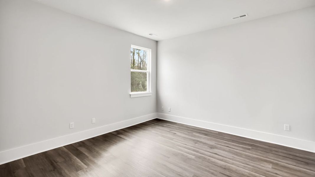 Spacious, unfurnished interior of a new home in The Pines at Blake Farm, Wilmington (Image 22).