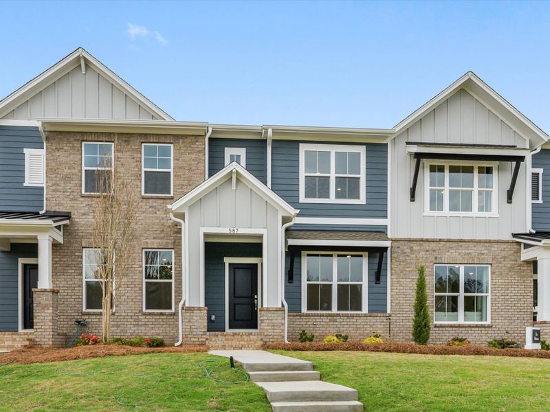 Front exterior of a new home in Hardy Pond Townhomes, Rock Hill, SC, highlighting curb appeal (Image 2). Front exterior of a new home in Hardy Pond Townhomes, Rock Hill, SC, highlighting curb appeal (Image 2).
