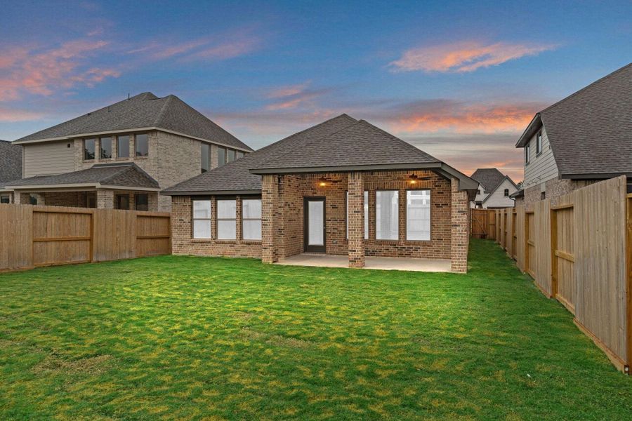 Exterior details and patio area of a home in The Highlands, Porter (Image 24).