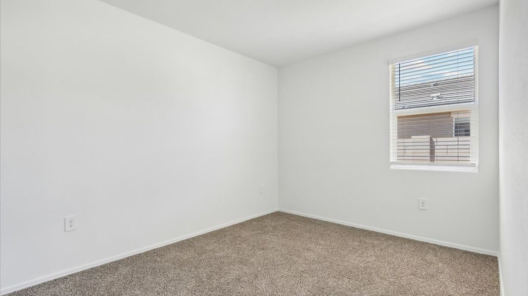 Spacious, unfurnished interior of a new home in Radiance at Superstition Vistas, Apache Junction (Image 22).