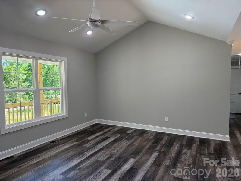 Living room with vaulted ceilings
