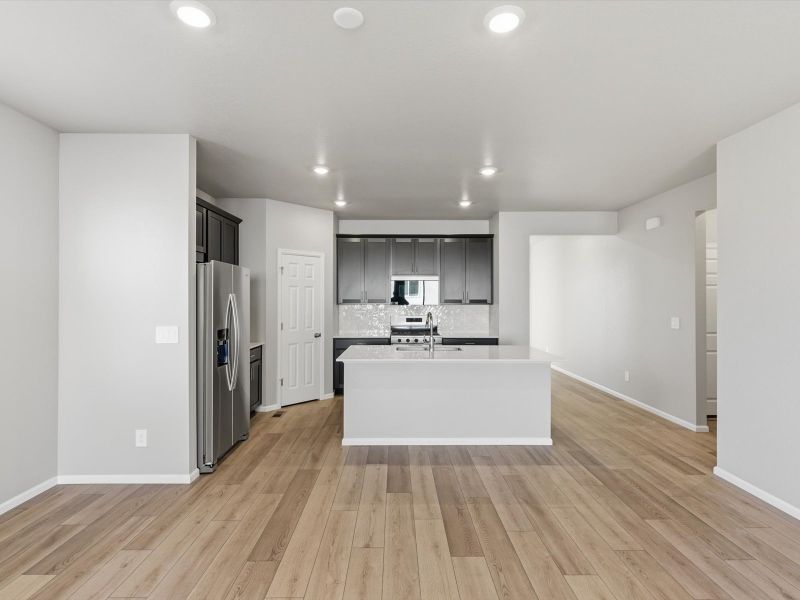 Furnished interior view inside a new home in Buffalo Highlands: The Canyon Collection, Commerce City (Image 7).