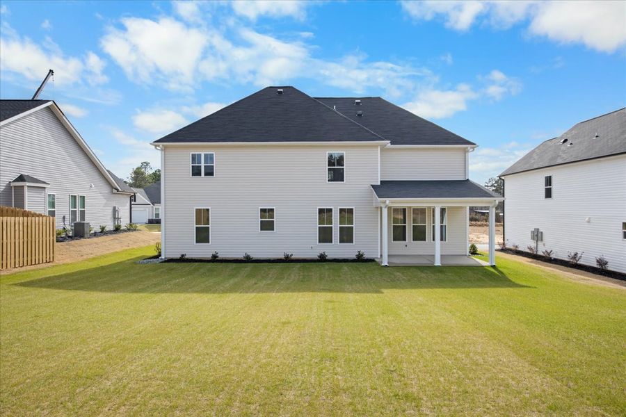 Exterior details and patio area of a home in Windsor, North Augusta (Image 20).