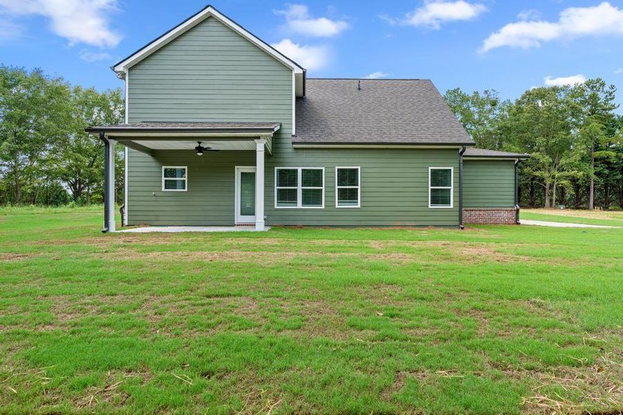 Front exterior of a new home in , McDonough, GA, highlighting curb appeal (Image 19).