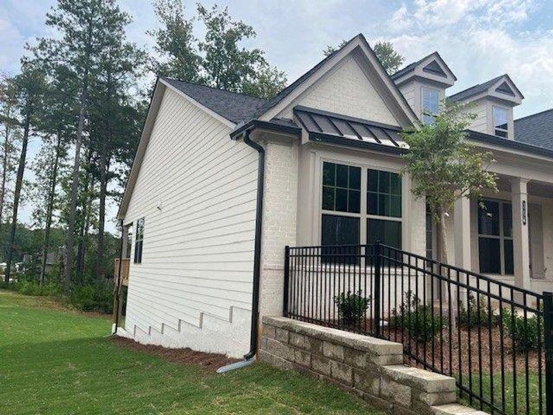 Exterior details and patio area of a home in Soleil Belmont Park, Canton (Image 21). Exterior details and patio area of a home in Soleil Belmont Park, Canton (Image 21).