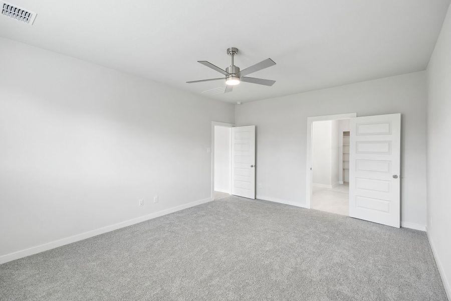 Primary Suite in the Winters home plan by Trophy Signature Homes – REPRESENTATIVE PHOTO