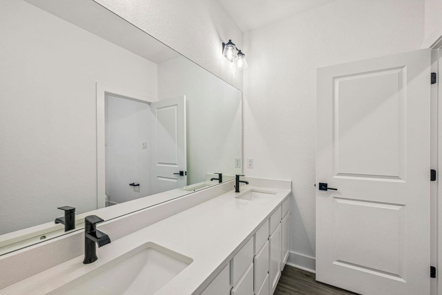 Furnished interior view inside a new home in Avery Centre, Round Rock (Image 9).
