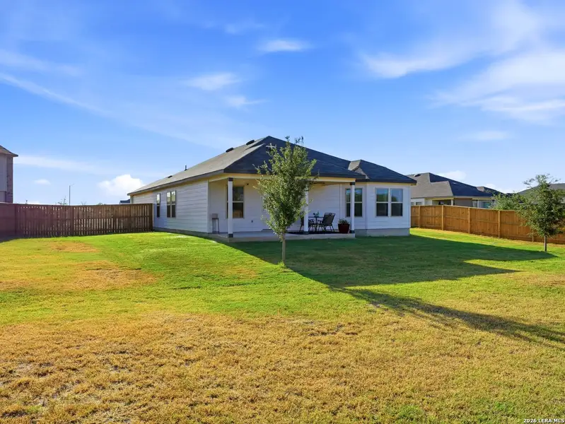 Exterior details and patio area of a home in Summer Hills, Atascosa (Image 4).