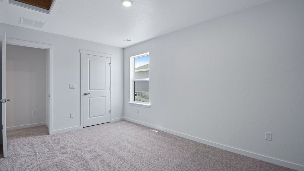 Spacious, unfurnished interior of a new home in Trails at Crowfoot, Parker (Image 40).