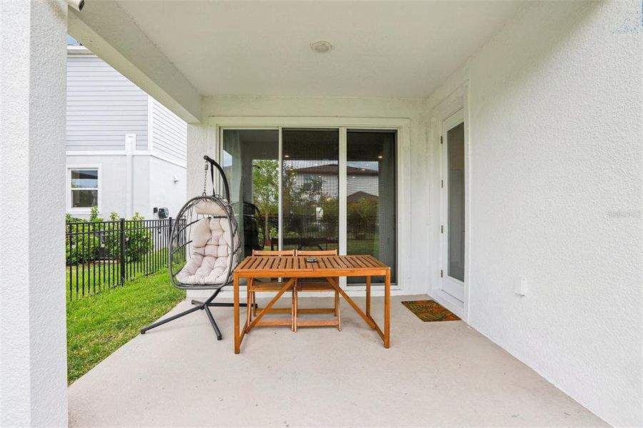 Exterior details and patio area of a home in Waterset Garden Series, Apollo Beach (Image 30).