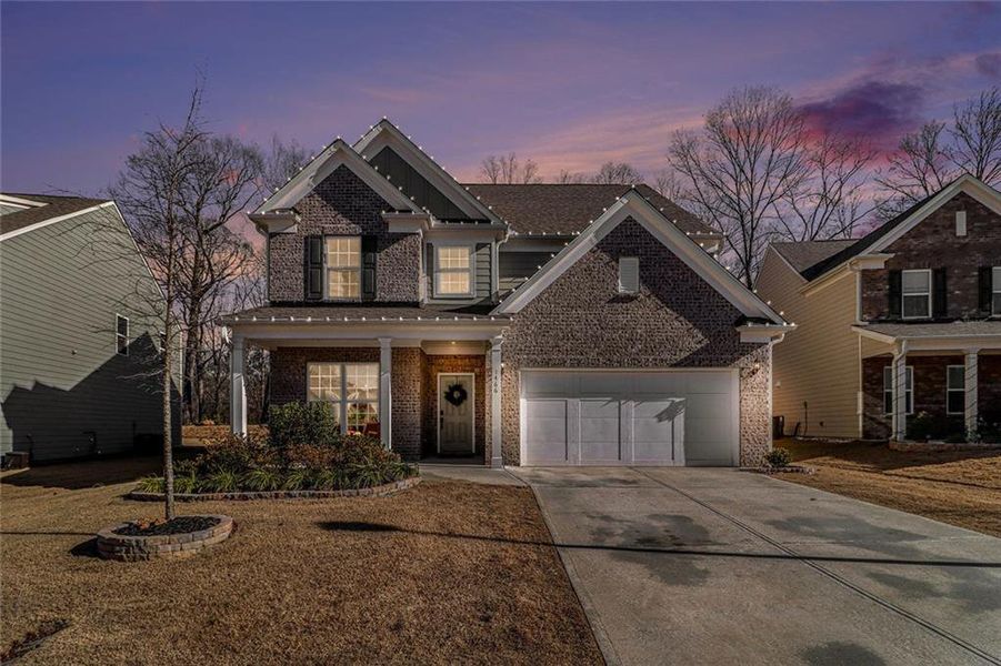 Front exterior of a new home in Pinebrook at Hamilton Mill, Auburn, GA, highlighting curb appeal (Image 1). Front exterior of a new home in Pinebrook at Hamilton Mill, Auburn, GA, highlighting curb appeal (Image 1).