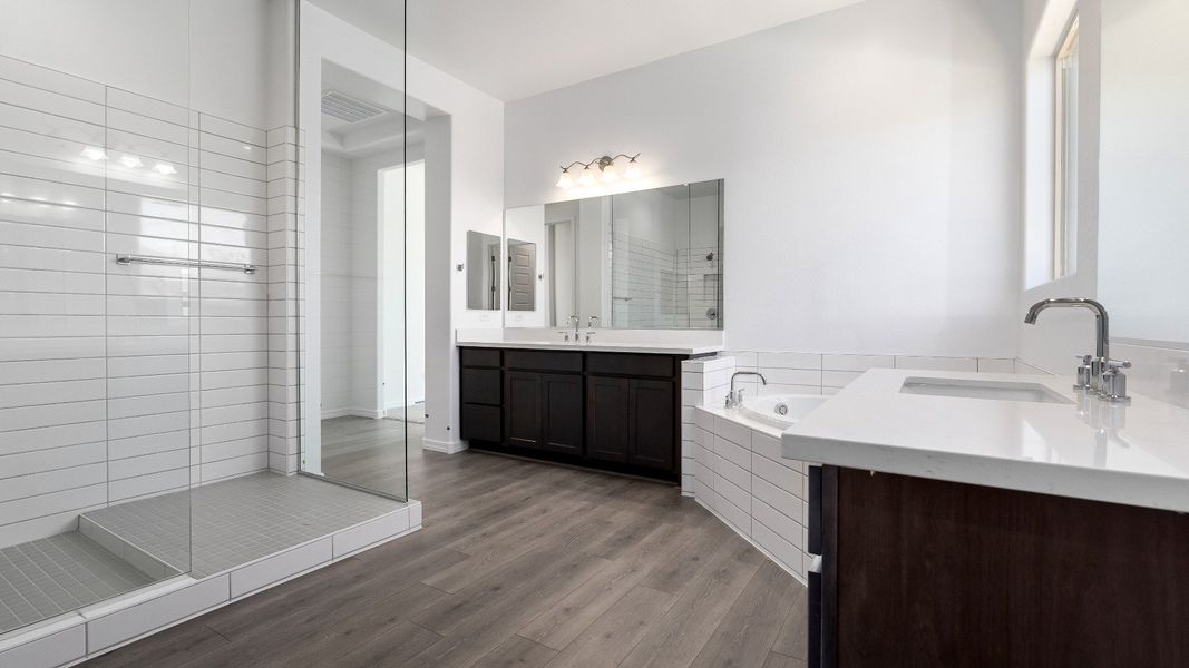 Representative furnished interior of a home built from the Granada by DRB Homes in Windrose, Waddell (Image 27).