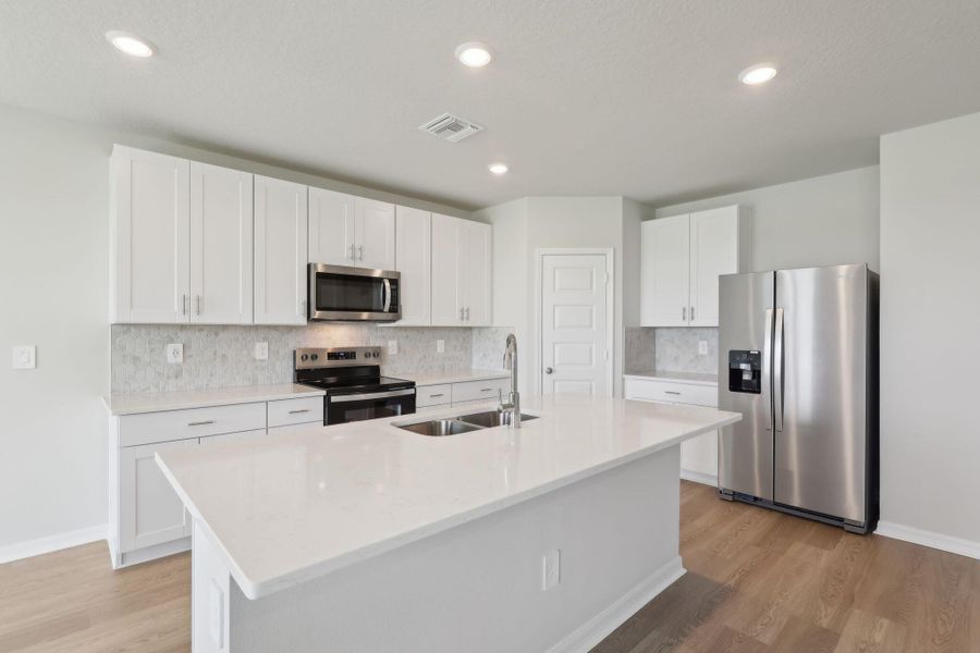 Furnished interior view inside a new home in Hampton Park - Classic Series, Vero Beach (Image 16).