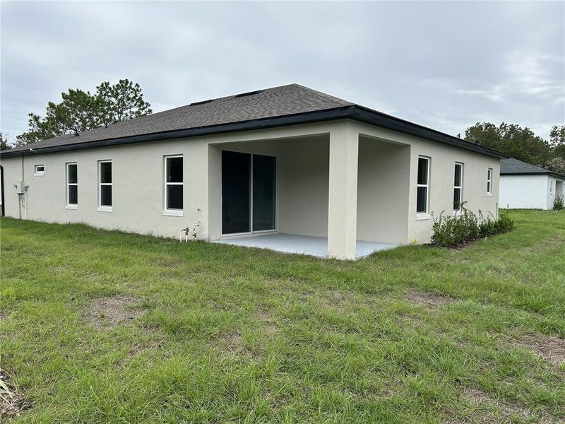 Exterior details and patio area of a home in , Brooksville (Image 3).