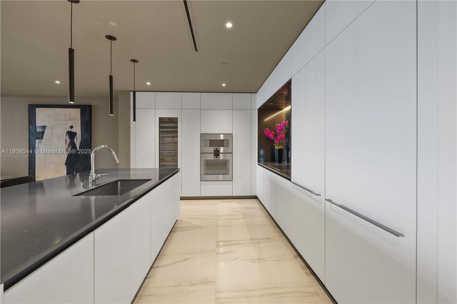 Spacious, unfurnished interior of a new home in Aston Martin Residences, Miami (Image 14).