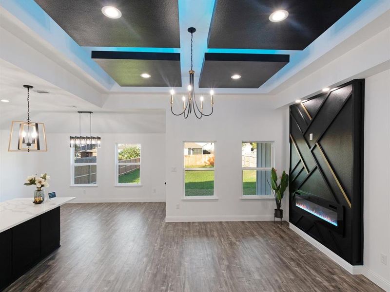 Unfurnished living room with dark hardwood / wood-style floors