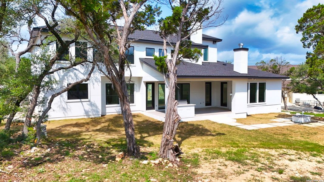 Exterior details and patio area of a home in , New Braunfels (Image 51).