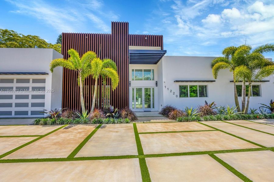 Front exterior of a new home in , Miami, FL, highlighting curb appeal (Image 33).