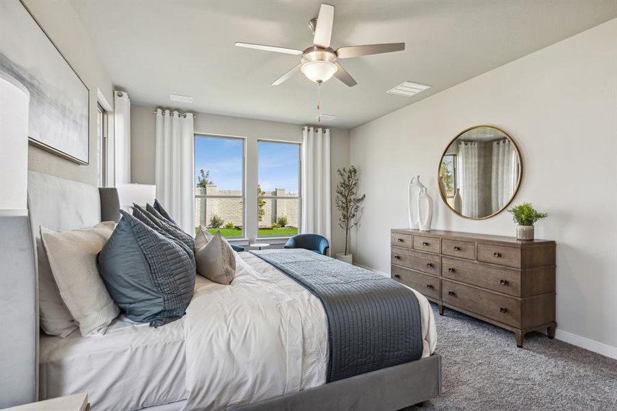 Primary bedroom in the Wimbledon home plan by Trophy Signature Homes – REPRESENTATIVE PHOTO Primary bedroom in the Wimbledon home plan by Trophy Signature Homes – REPRESENTATIVE PHOTO