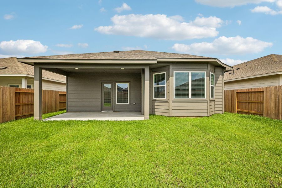 Exterior details and patio area of a home in Riviera Pines - Premier Series, Huffman (Image 20).