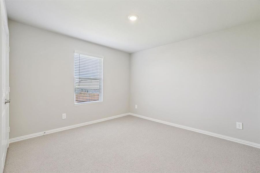 Spacious, unfurnished interior of a new home in Simpson Crossing - Spring Series, McKinney (Image 25).