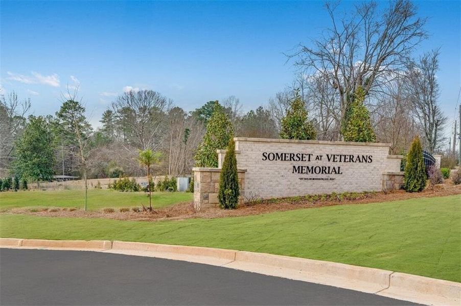 Front exterior of a new home in Somerset at Veterans Memorial, Mableton, GA, highlighting curb appeal (Image 19).